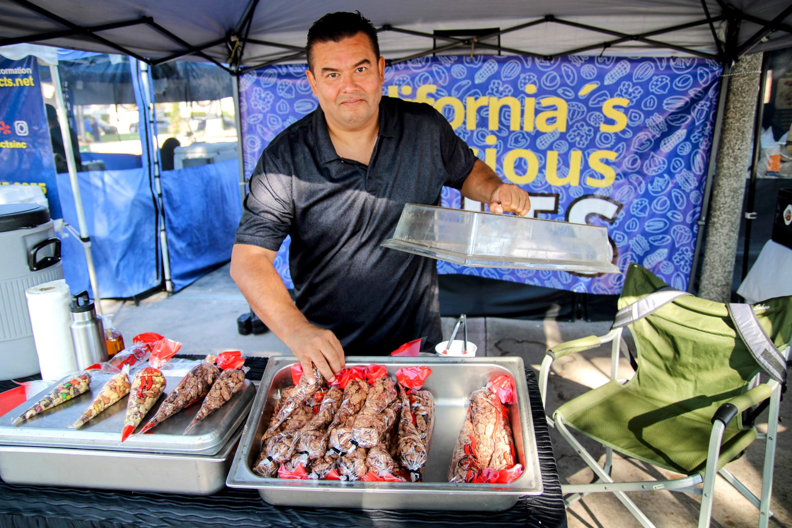 Mario at the California's Delicious Nuts market stand