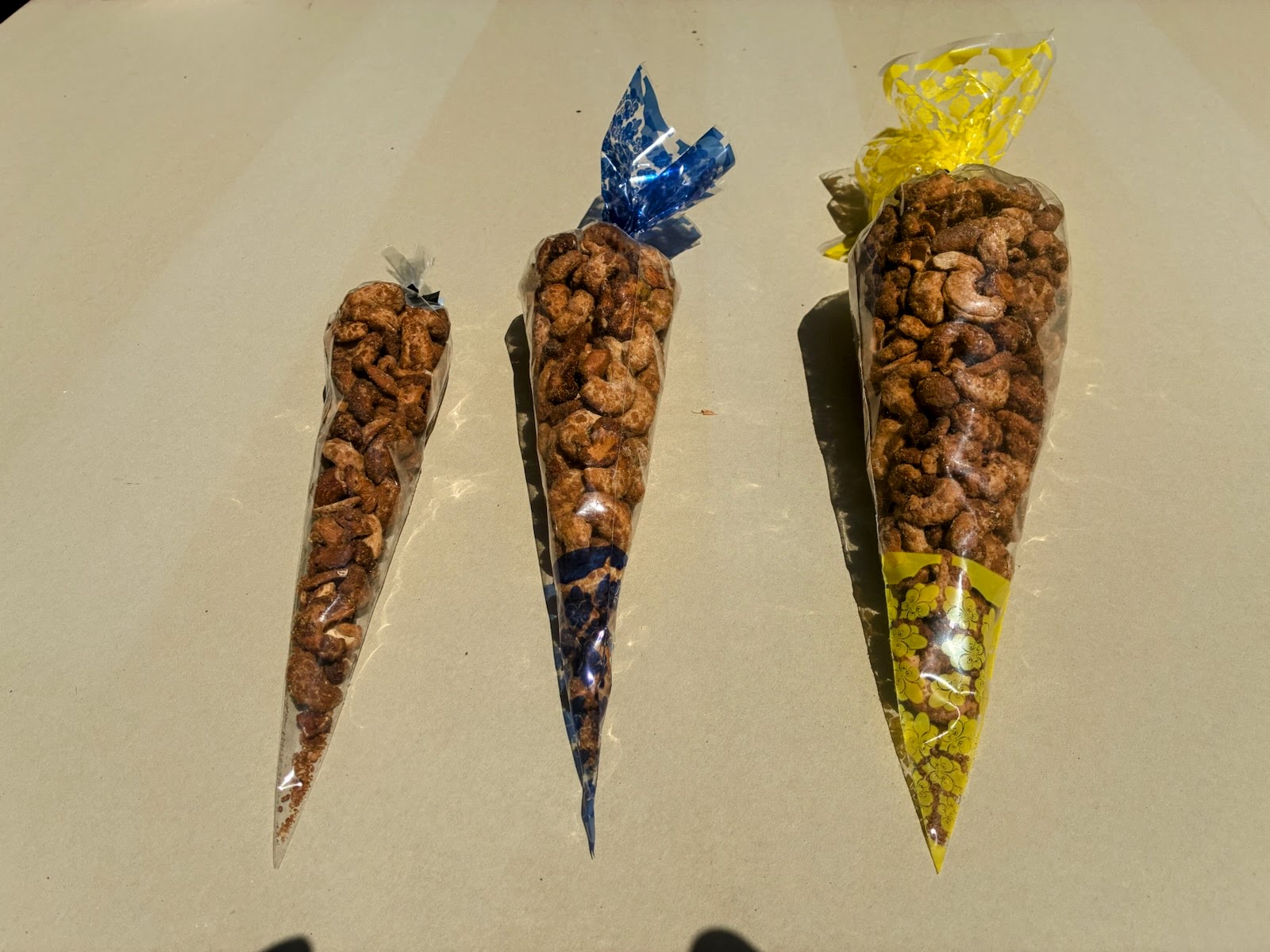 Three California's Delicious Nuts package sizes